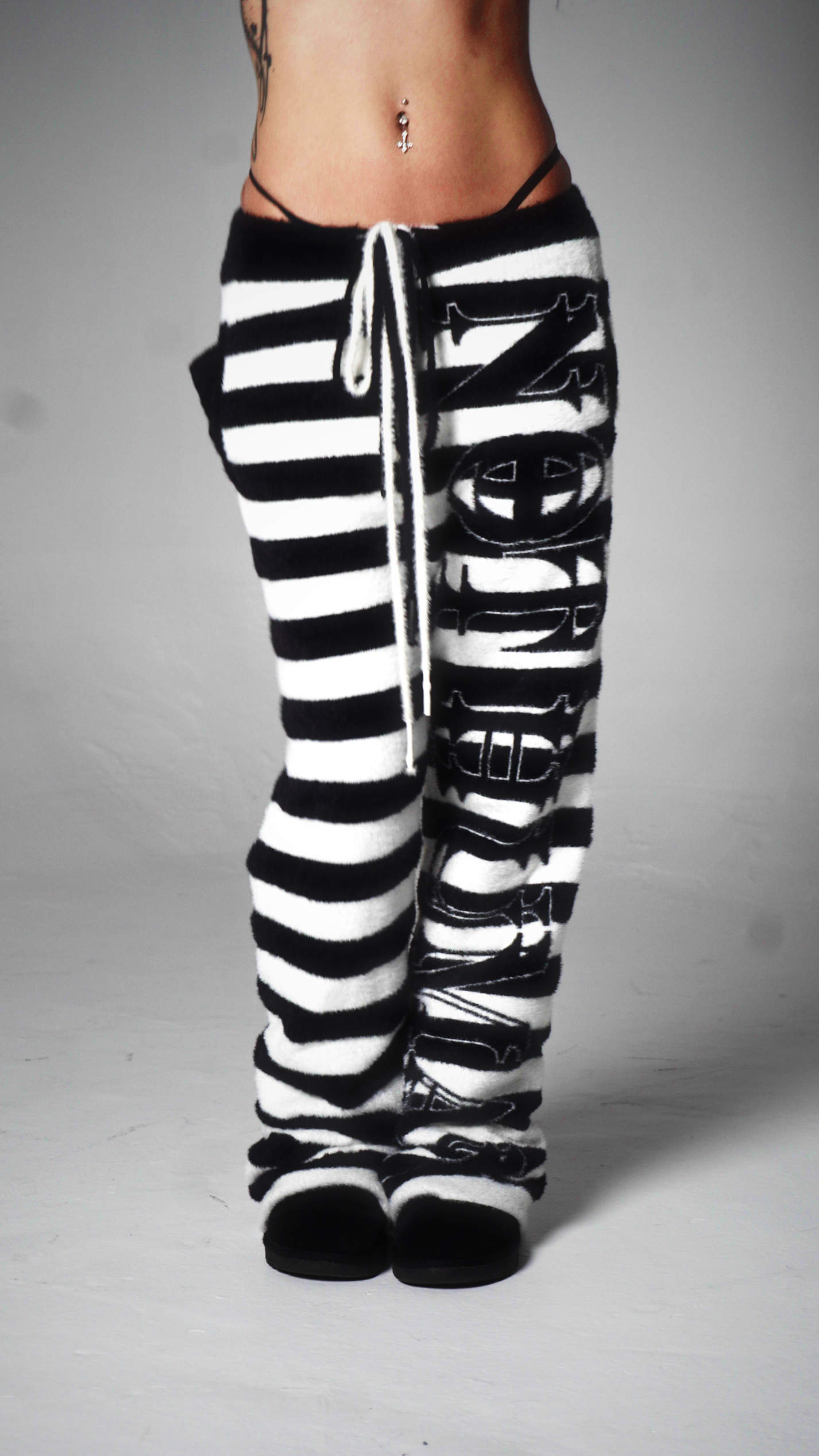 "NOT HUMAN" STRIPPED LOUNGE SWEATS