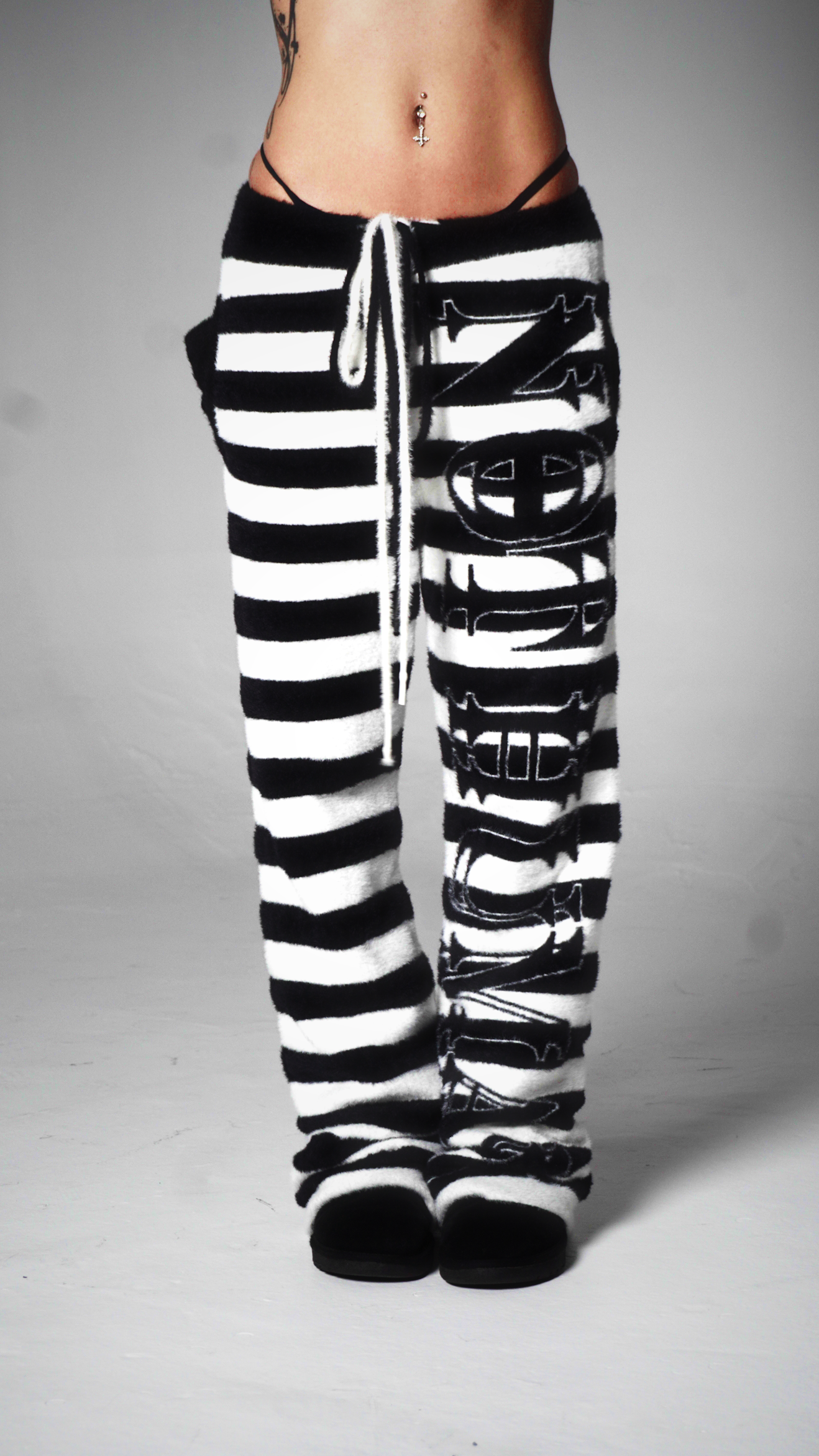 "NOT HUMAN" STRIPPED LOUNGE SWEATS