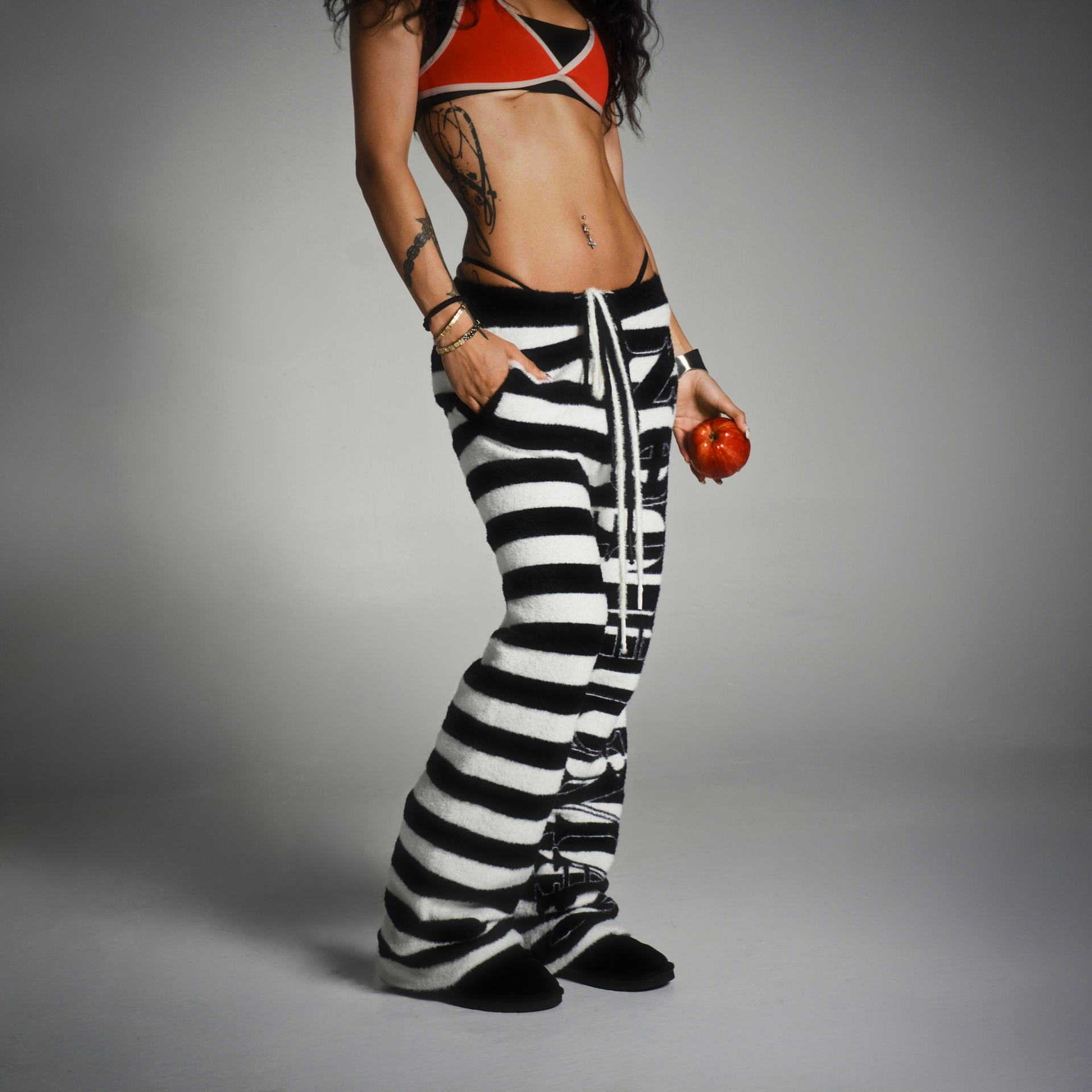 "NOT HUMAN" STRIPPED LOUNGE SWEATS